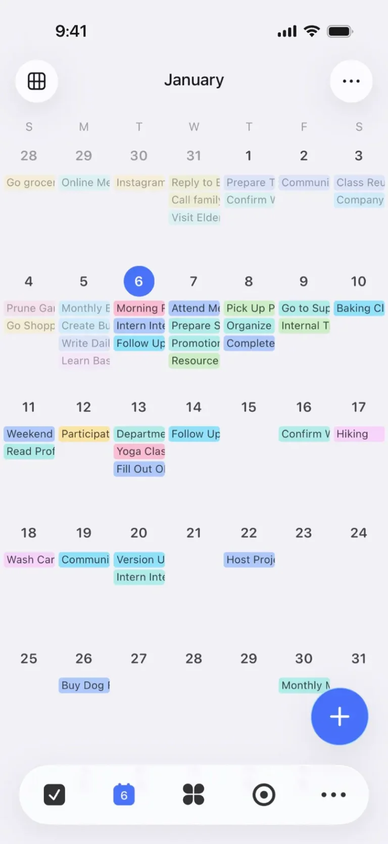 Vue calendrier mensuelle de l'application mobile TickTick avec tâches colorées affichées sur chaque jour